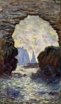  claude art - L’aiguille de roche vue à travers la Porte d’Aumont Claude Monet